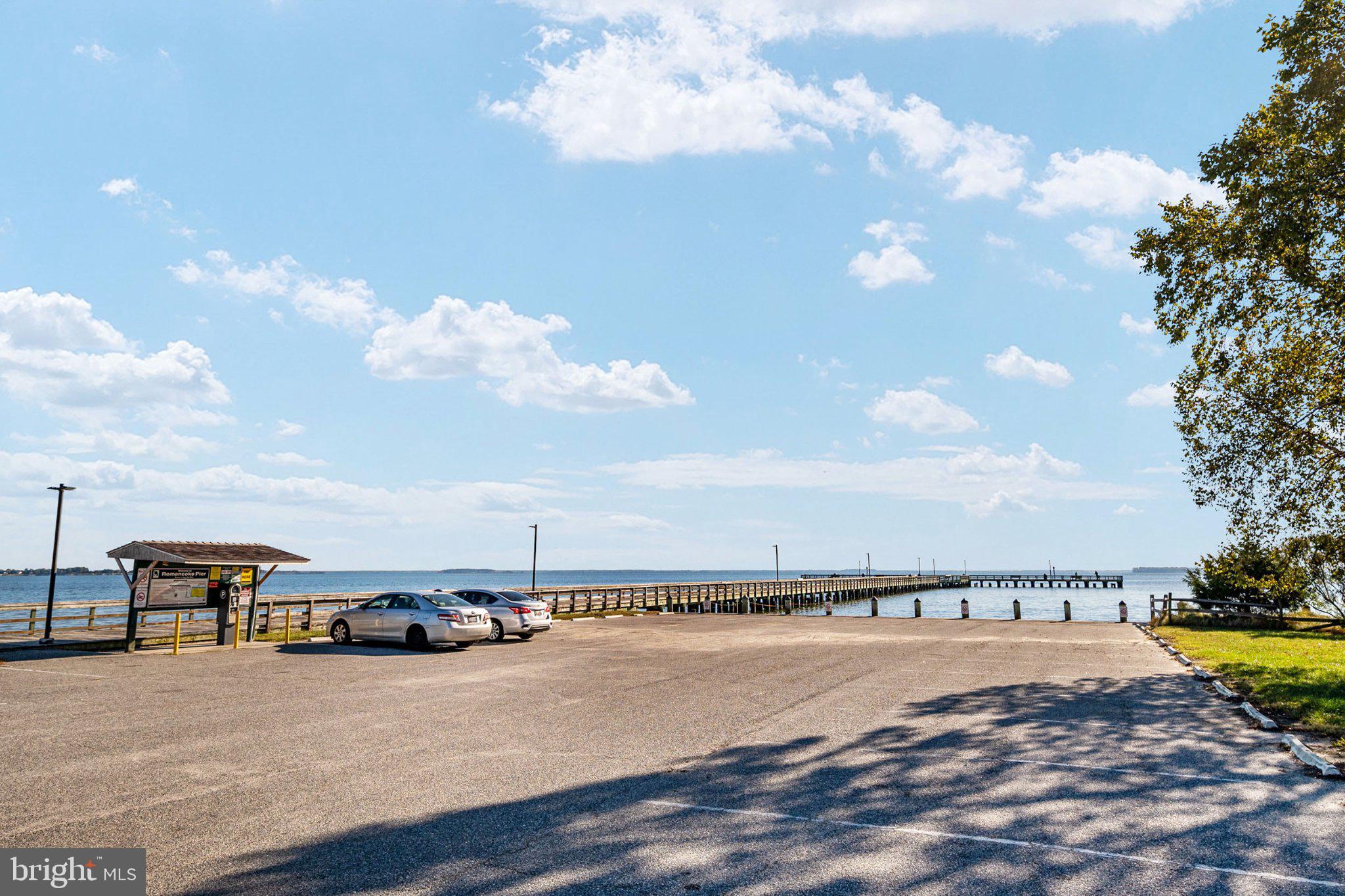230 Long Point Road Stevensville, MD 21666 - Photo 27 of 41 Tranquil pier by the shimmering water.