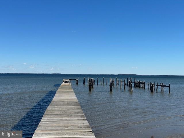 230 Long Point Road Stevensville, MD 21666 - Photo 38 of 41 Tranquil dock by the serene waters.