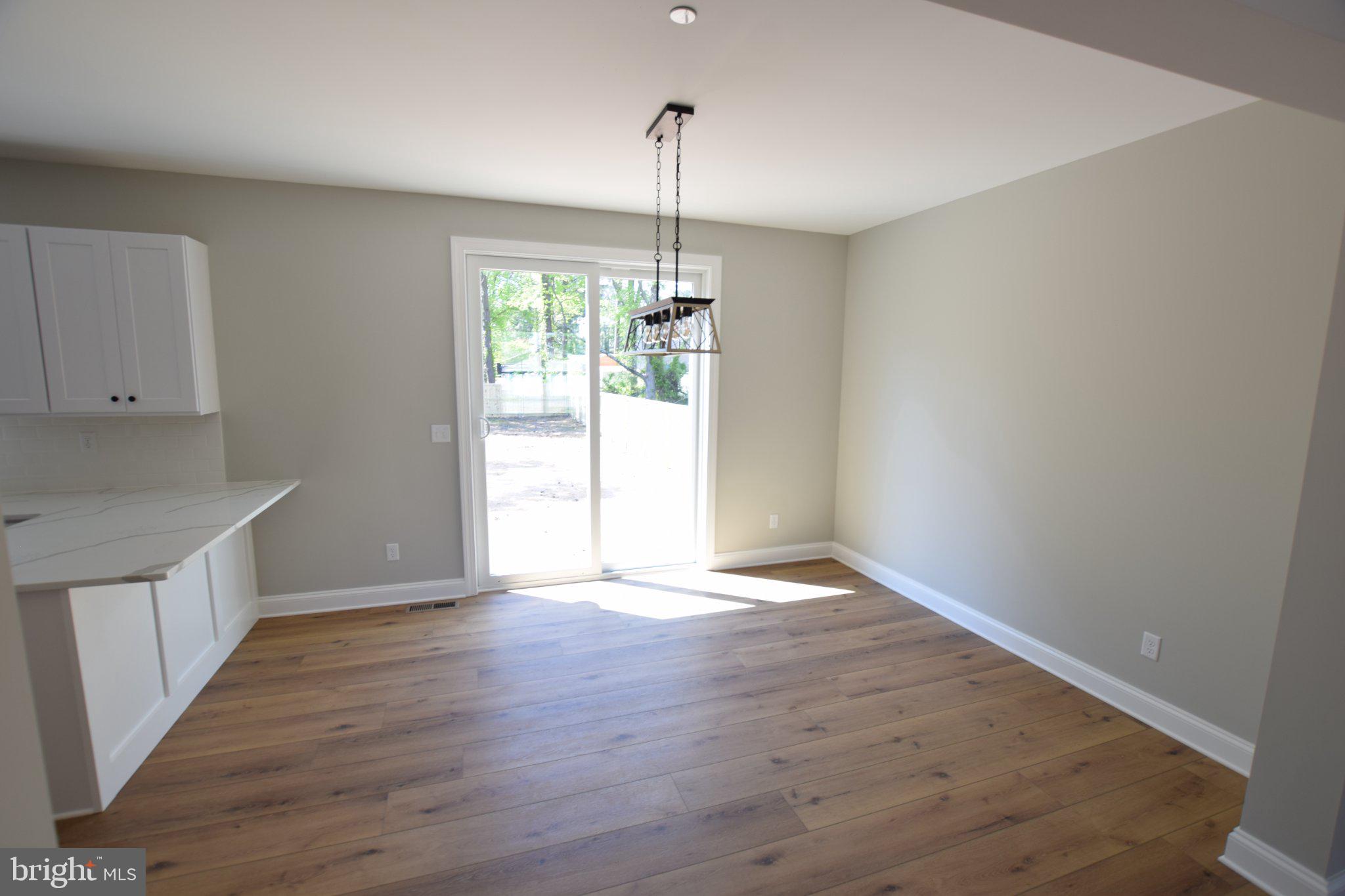 230 Long Point Road Stevensville, MD 21666 - Photo 9 of 41 Bright and airy open space awaits.
