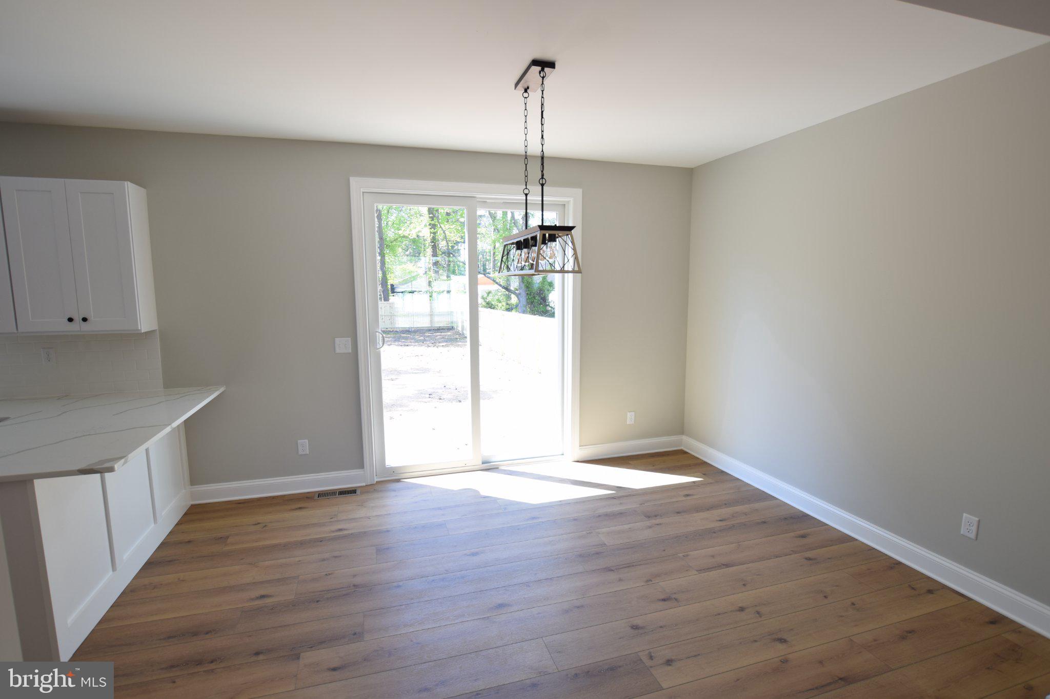 230 Long Point Road Stevensville, MD 21666 - Photo 10 of 41 Bright and airy open space awaits.