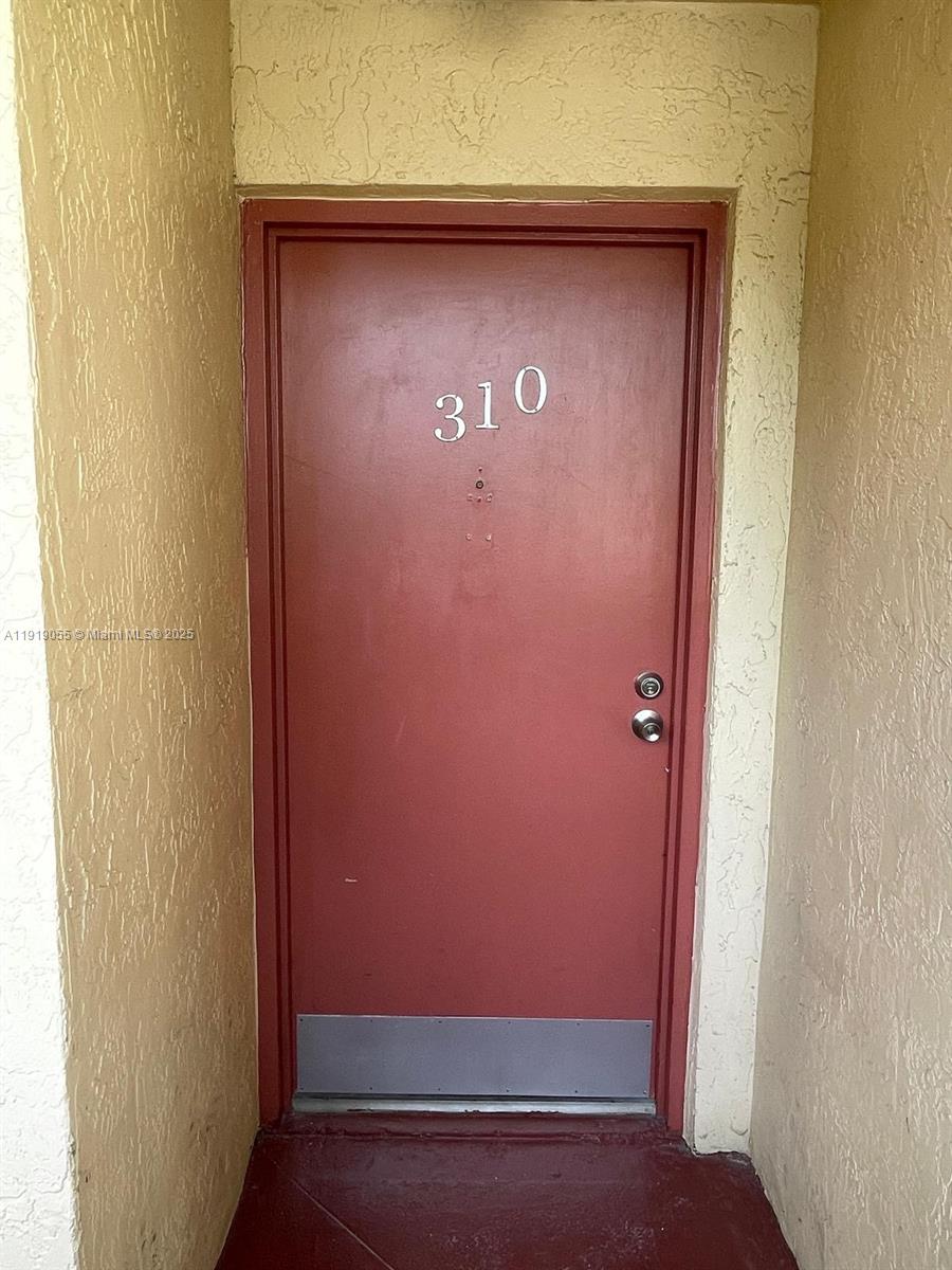 3410 Foxcroft Road, Unit 310 Miramar, FL 33025 - Photo 21 of 21 a view of door