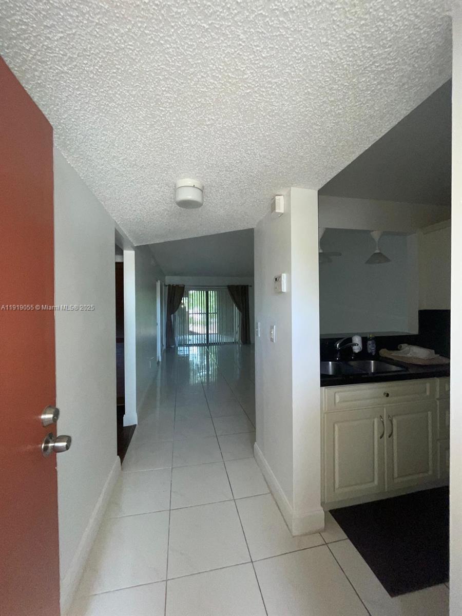 3410 Foxcroft Road, Unit 310 Miramar, FL 33025 - Photo 4 of 21 a view of a kitchen with a sink