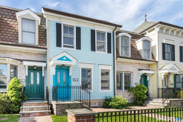a front view of a house with a porch