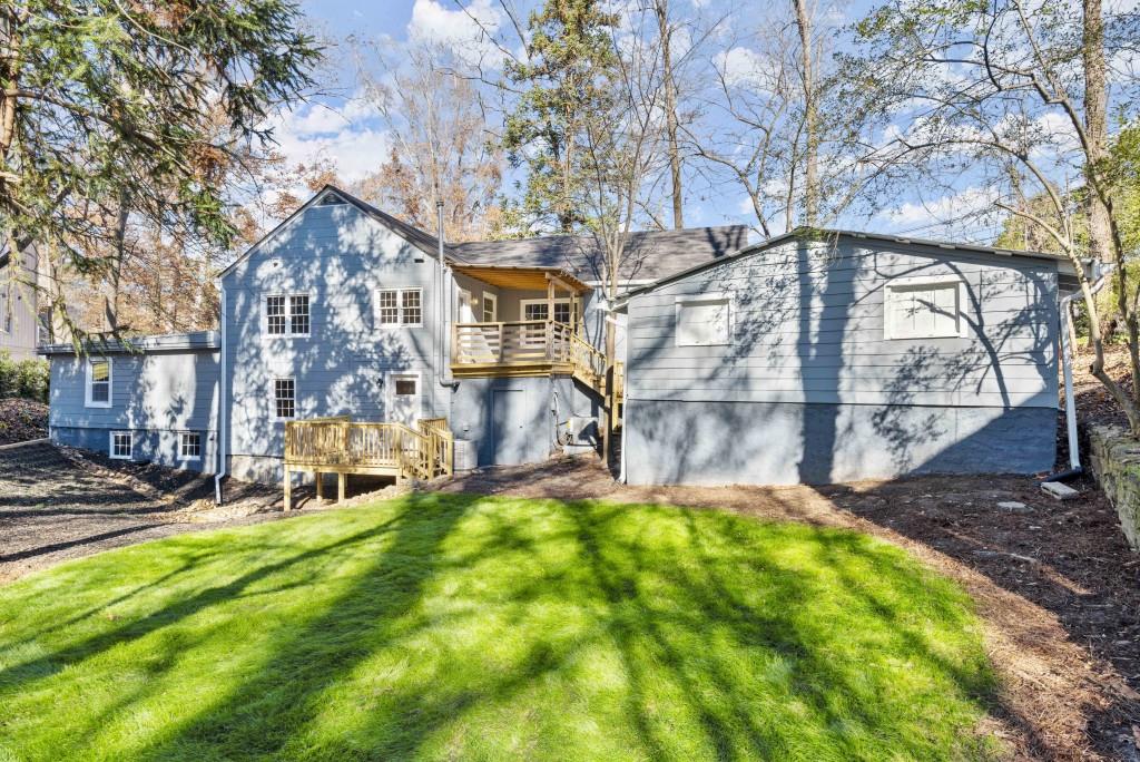 3310 East Roxboro Road Northeast Atlanta, GA 30324 - Photo 16 of 47 a view of yard with swimming pool and sitting area