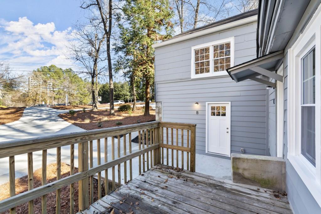 3310 East Roxboro Road Northeast Atlanta, GA 30324 - Photo 22 of 47 a view of a house with a wooden deck