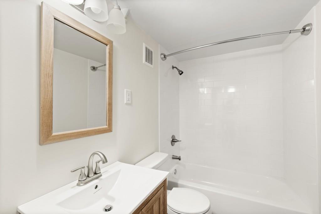 3310 East Roxboro Road Northeast Atlanta, GA 30324 - Photo 41 of 47 a bathroom with a sink toilet and shower
