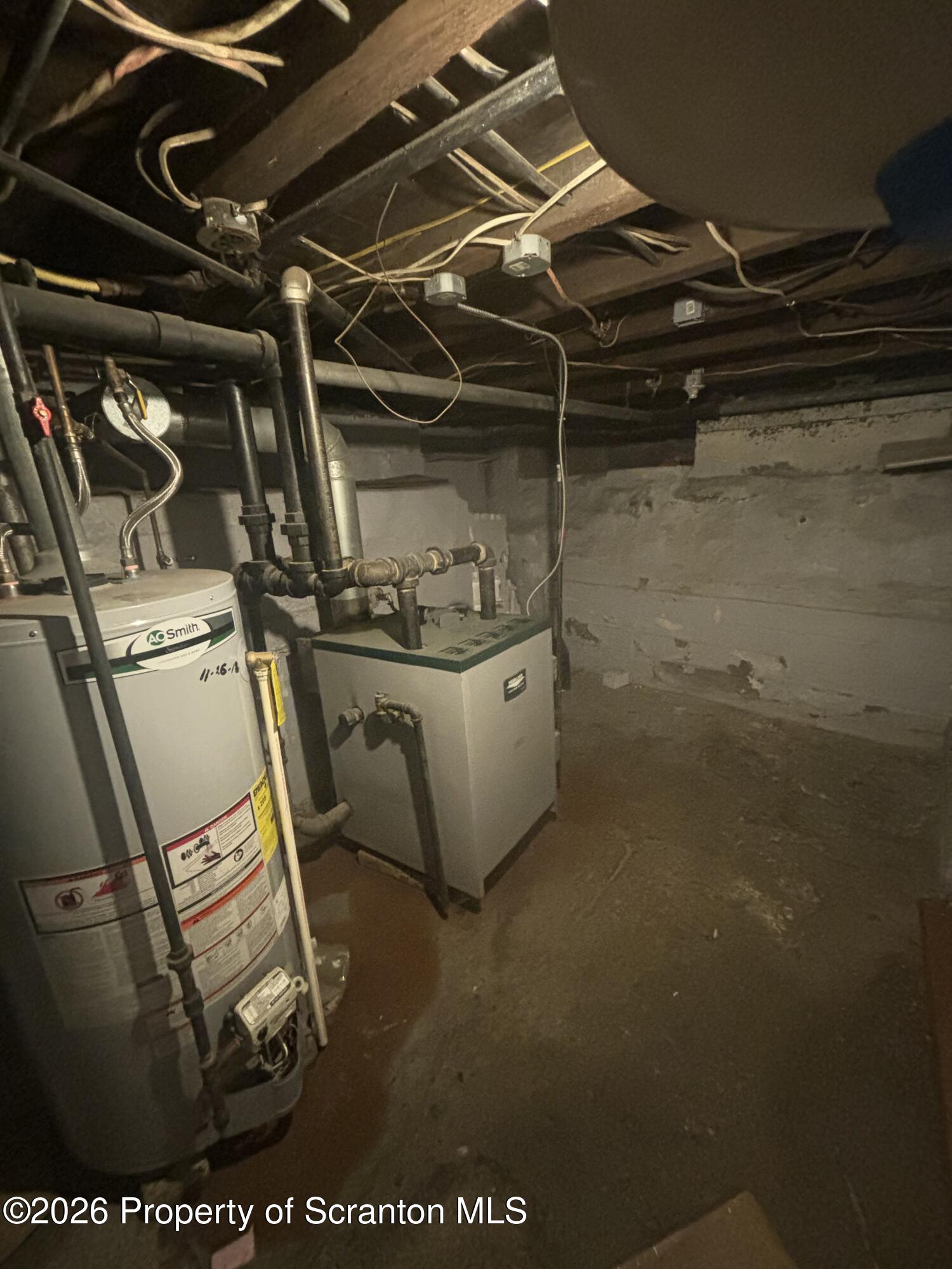 818 Capouse Avenue Scranton, PA 18509 - Photo 8 of 10 a utility room with dryer and washer