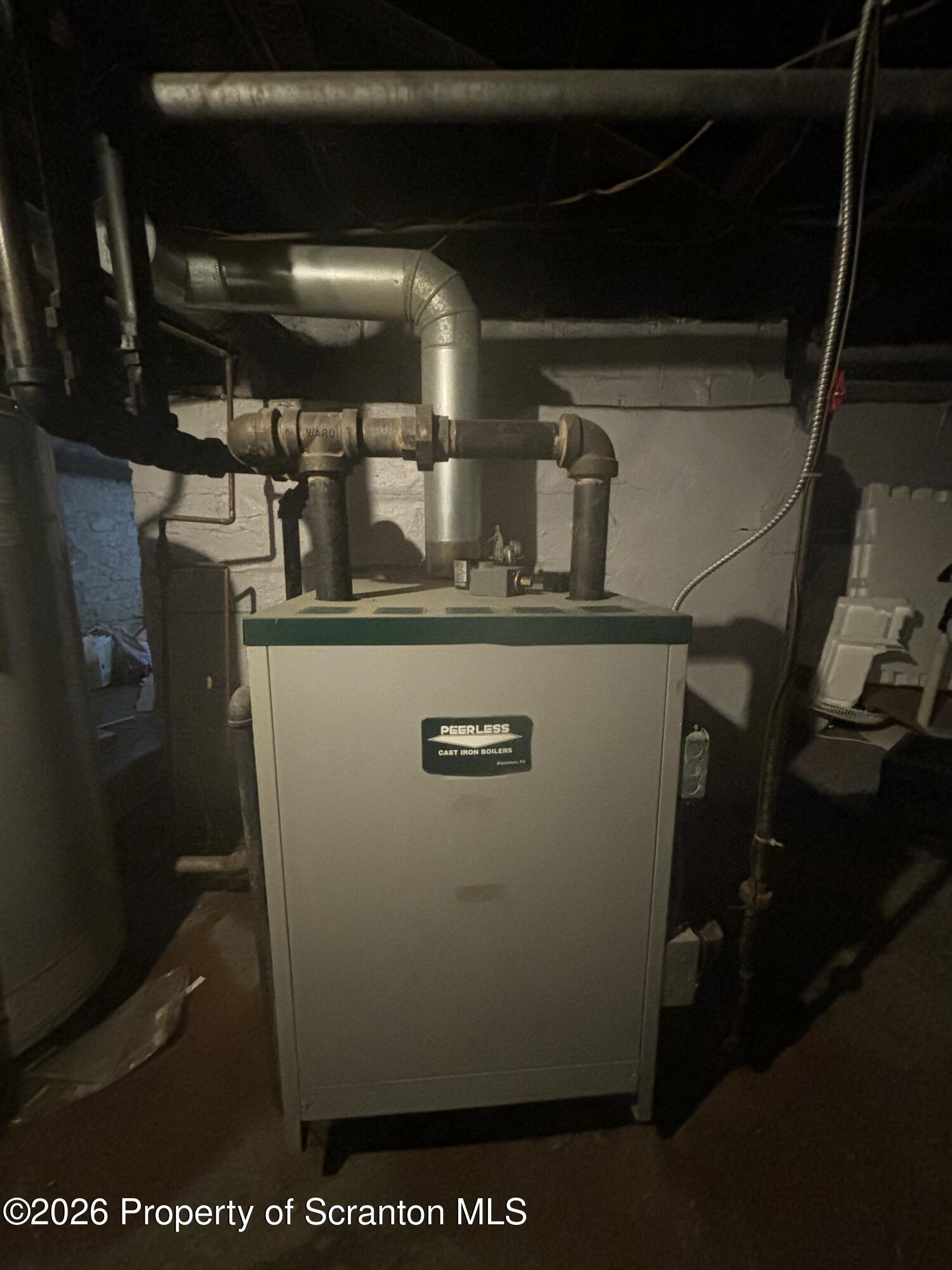 818 Capouse Avenue Scranton, PA 18509 - Photo 9 of 10 a view of water heater room