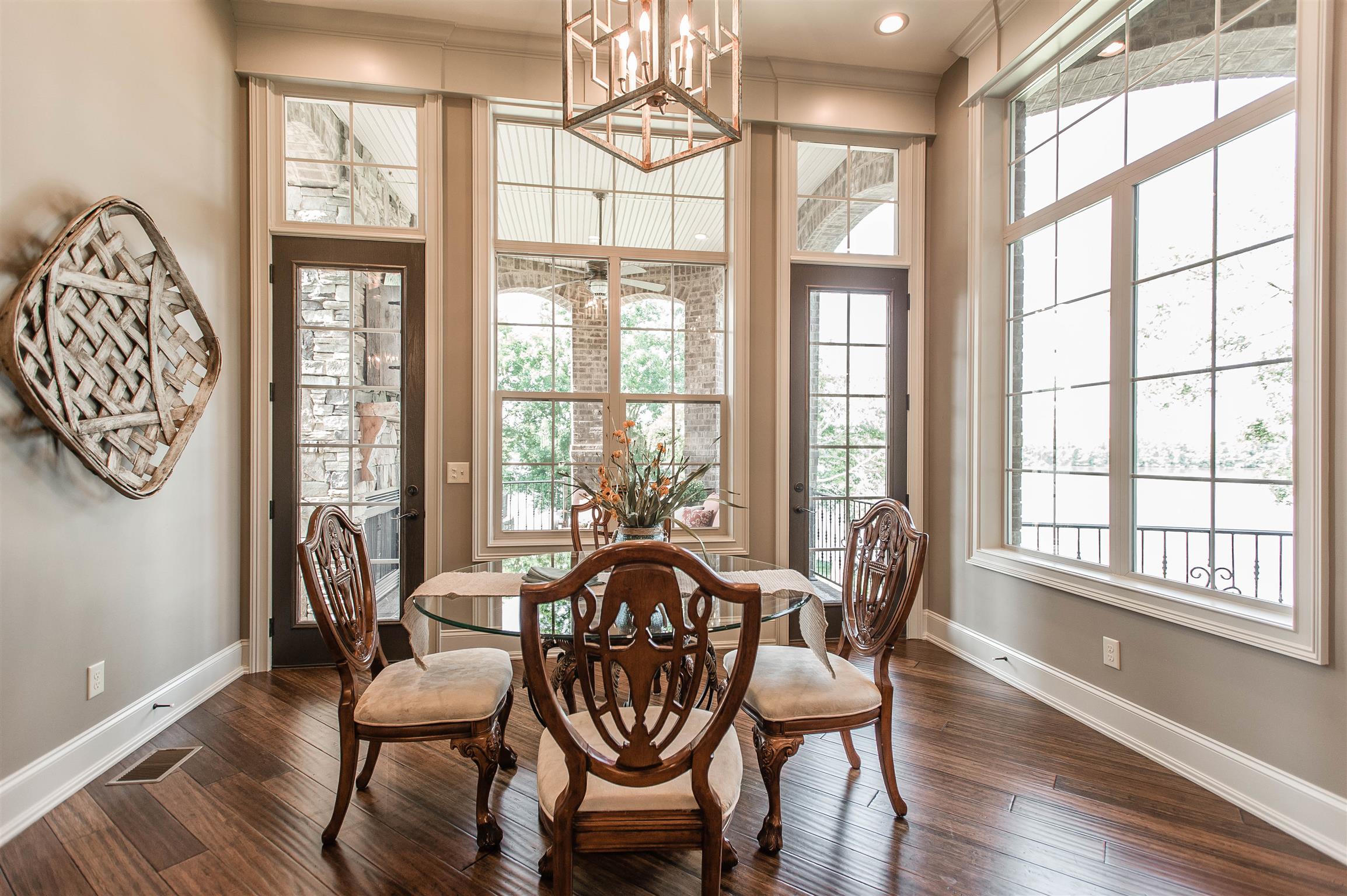 148 Cherokee Road Hendersonville, TN 37075 - Photo 13 of 30 a view of a dining room with furniture wooden floor and a window