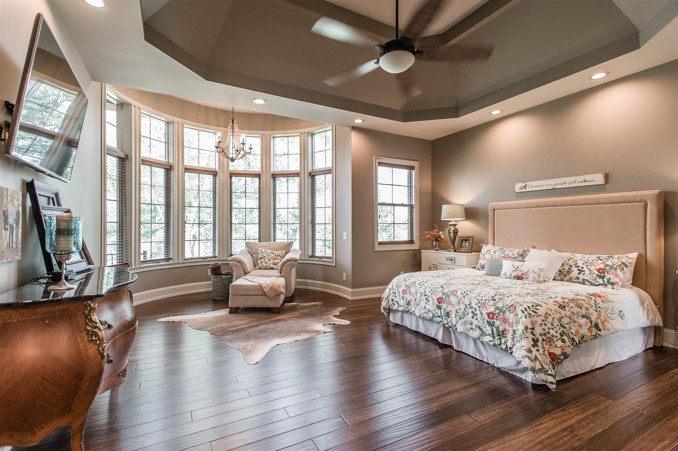 148 Cherokee Road Hendersonville, TN 37075 - Photo 14 of 30 a bedroom with a large bed and a large window