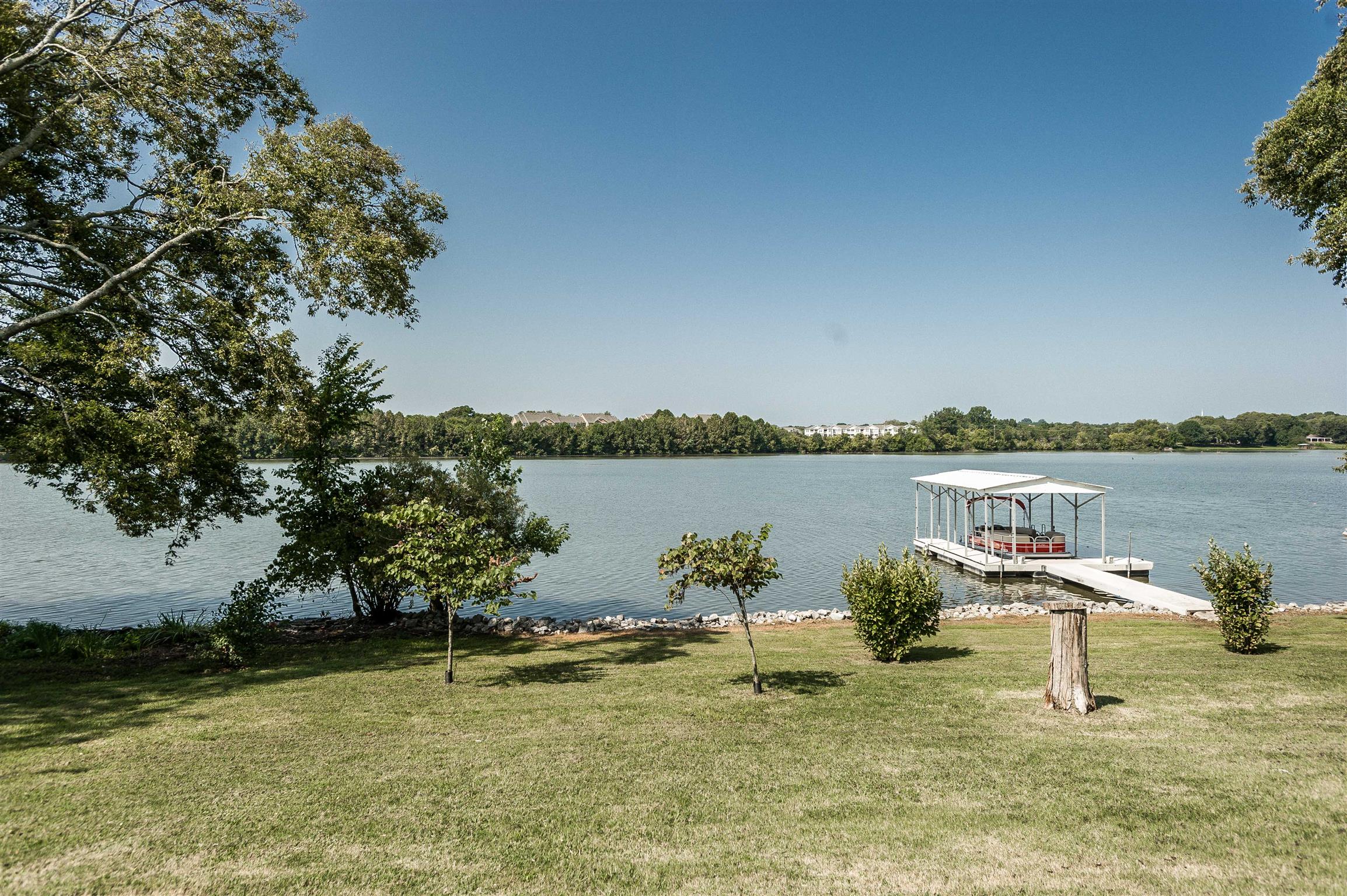 148 Cherokee Road Hendersonville, TN 37075 - Photo 25 of 30 a view of a lake with houses in the back