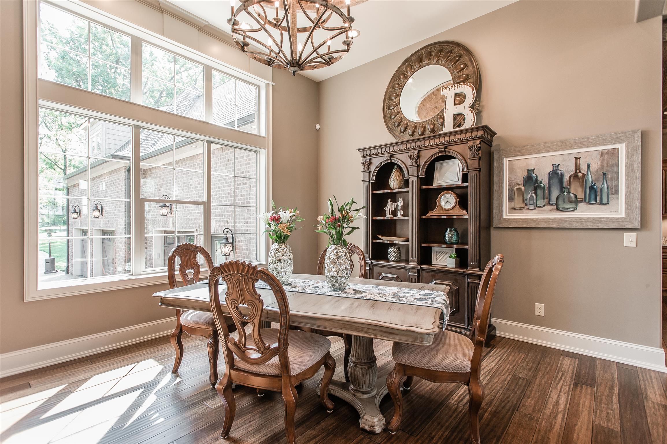 148 Cherokee Road Hendersonville, TN 37075 - Photo 7 of 30 a view of a dining room with furniture window and wooden floor