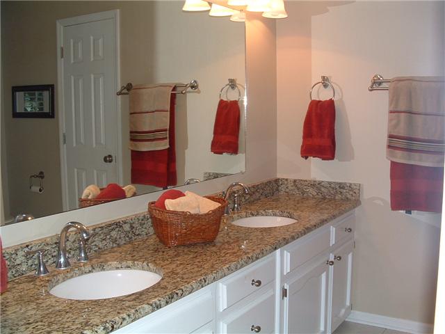 2212 Red Mile Road Murfreesboro, TN 37127 - Photo 11 of 20 You'll love this owner's bath with double vanities, granite countertop, tile floors and garden tub.