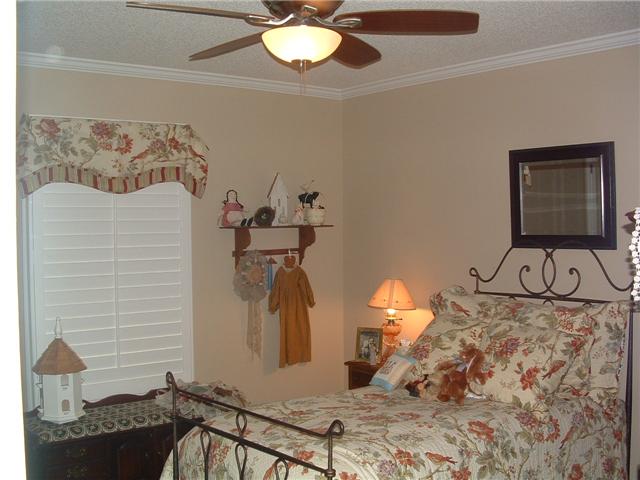 2212 Red Mile Road Murfreesboro, TN 37127 - Photo 12 of 20 This lovely bedroom will be perfect for guests with plantation shutters and frieze carpet.