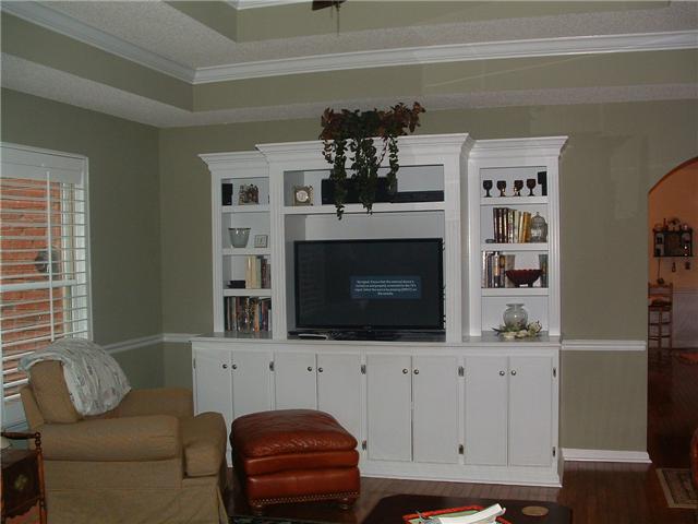 2212 Red Mile Road Murfreesboro, TN 37127 - Photo 3 of 20 Another view of Great Room with built-in cabinets and plantation shutters throughout the home.