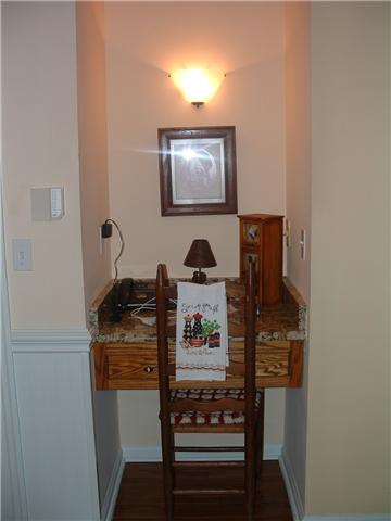 2212 Red Mile Road Murfreesboro, TN 37127 - Photo 8 of 20 What a great little built-in desk in this lovely kitchen.