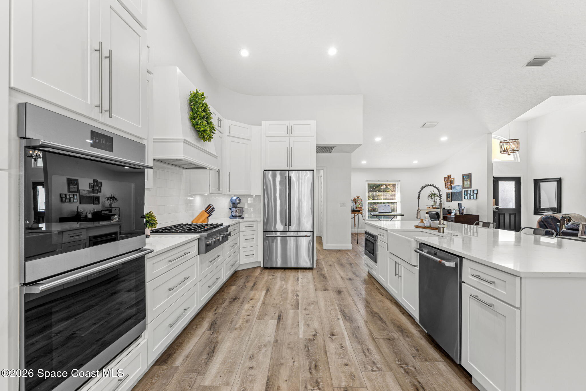 482 Veracruz Boulevard Indialantic, FL 32903 - Photo 12 of 45 a large kitchen with stainless steel appliances lots of counter space and a sink