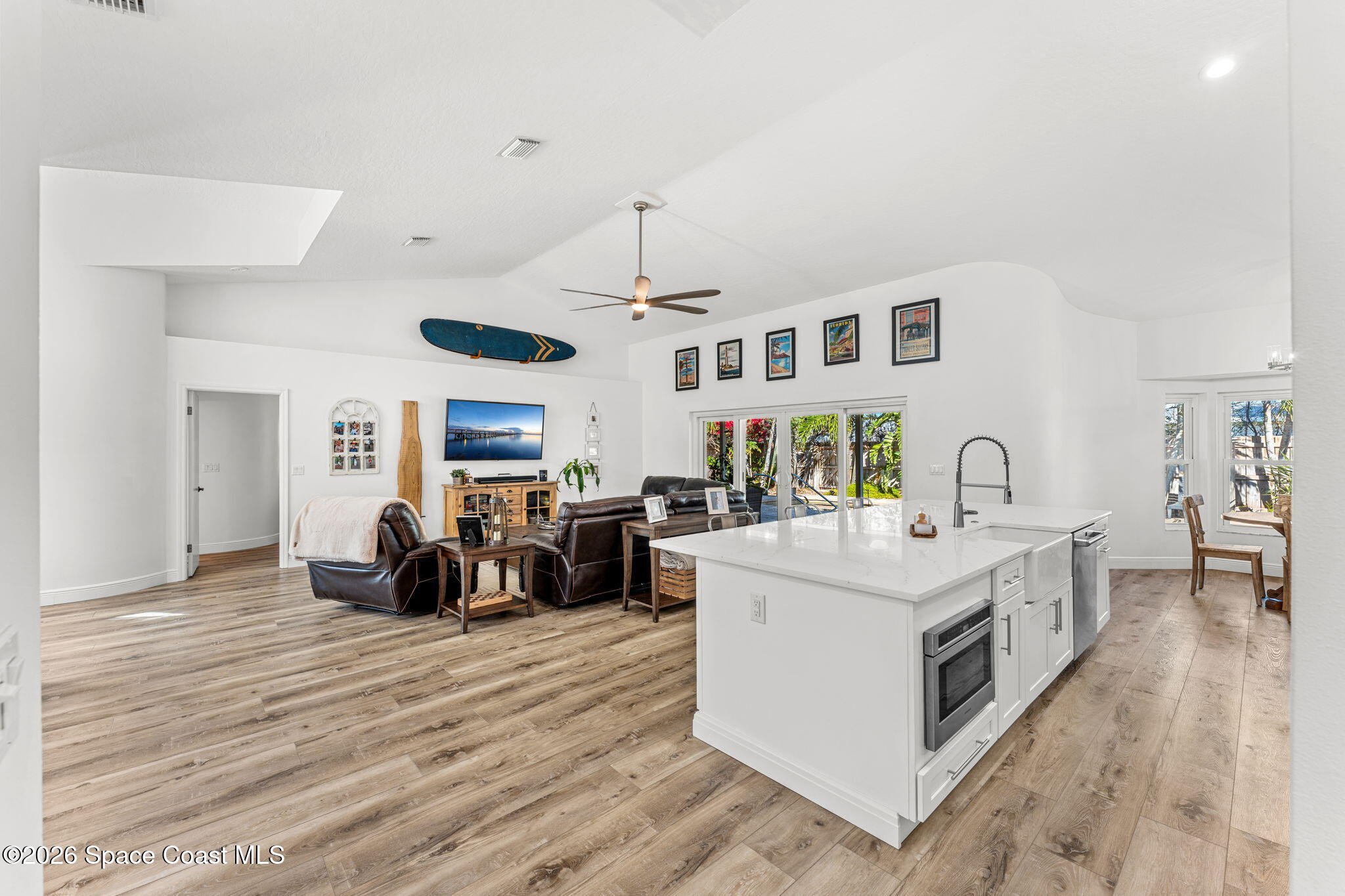 482 Veracruz Boulevard Indialantic, FL 32903 - Photo 16 of 45 a view of living room with furniture and a chandelier