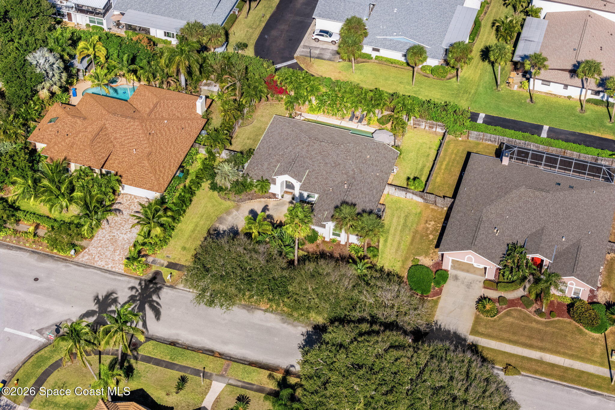 482 Veracruz Boulevard Indialantic, FL 32903 - Photo 3 of 45 an aerial view of a house with a yard basket ball court and a patio