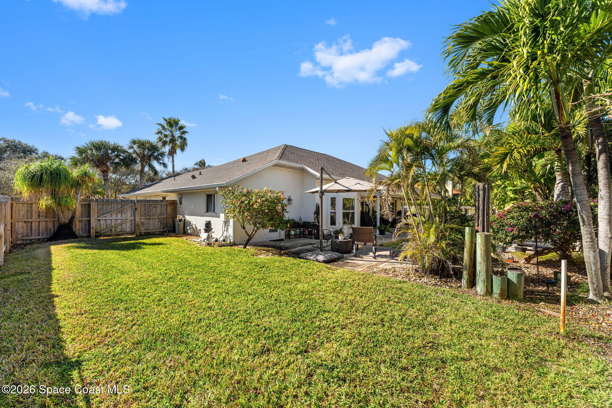 482 Veracruz Boulevard Indialantic, FL 32903 - Photo 34 of 45 a view of a house with yard and sitting area