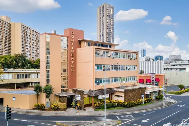 a view of street with large building