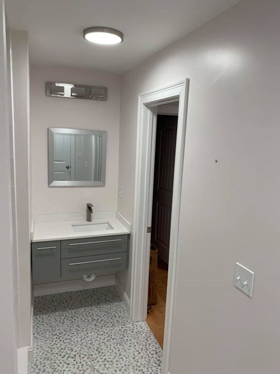 40 Lafayette Road, Unit 2 Salisbury, MA 01952 - Photo 13 of 31 a bathroom with a sink and a mirror