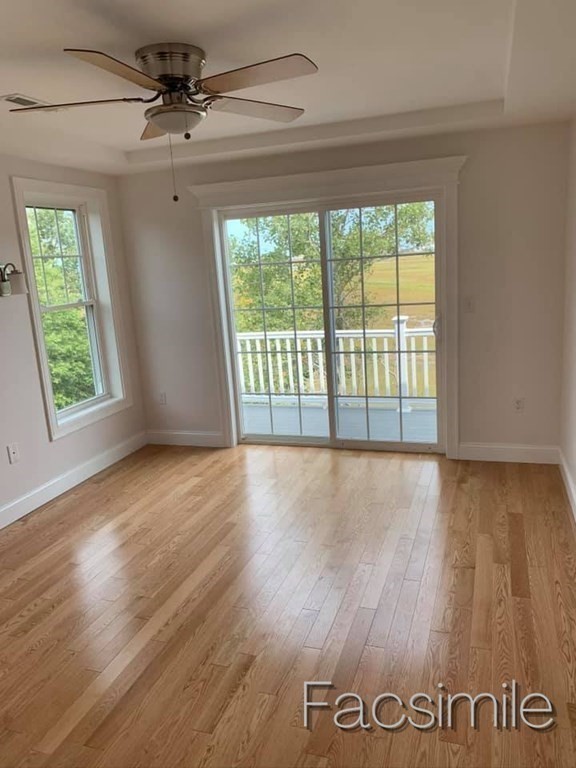 40 Lafayette Road, Unit 2 Salisbury, MA 01952 - Photo 16 of 31 a view of an empty room with wooden floor and a window