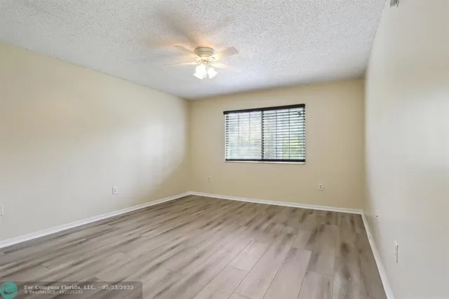 $275,000 | 5051 Wiles Road, Unit 201, Coconut Creek, FL 33073