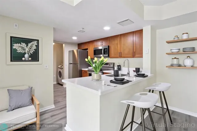 $275,000 | 5051 Wiles Road, Unit 201, Coconut Creek, FL 33073