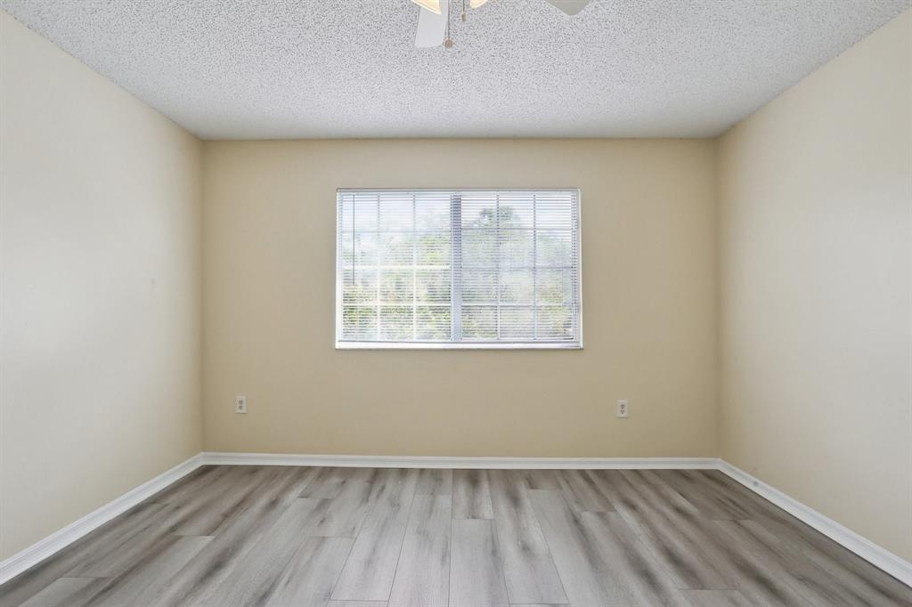 5051 Wiles Road, Unit 201 Coconut Creek, FL 33073 - Photo 23 of 41 2nd Bedroom