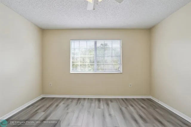 $275,000 | 5051 Wiles Road, Unit 201, Coconut Creek, FL 33073