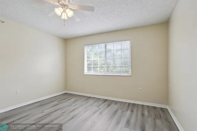 $275,000 | 5051 Wiles Road, Unit 201, Coconut Creek, FL 33073