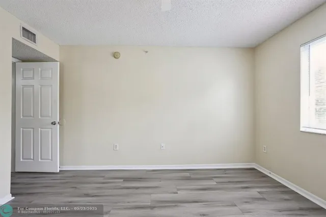$275,000 | 5051 Wiles Road, Unit 201, Coconut Creek, FL 33073