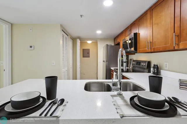 $275,000 | 5051 Wiles Road, Unit 201, Coconut Creek, FL 33073