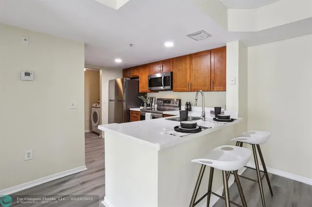 $275,000 | 5051 Wiles Road, Unit 201, Coconut Creek, FL 33073