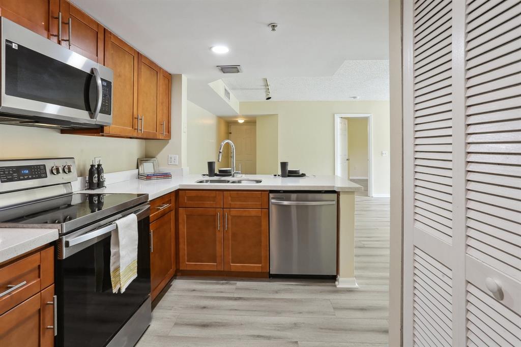 5051 Wiles Road, Unit 201 Coconut Creek, FL 33073 - Photo 6 of 41