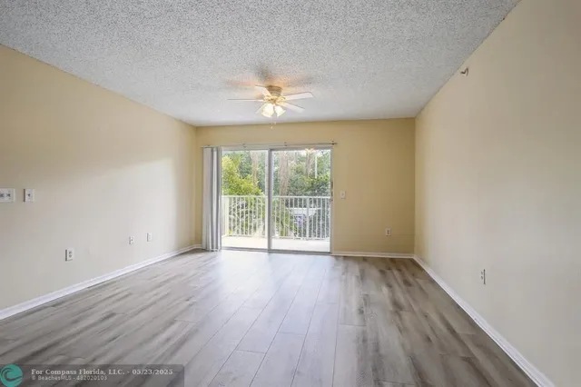 $275,000 | 5051 Wiles Road, Unit 201, Coconut Creek, FL 33073