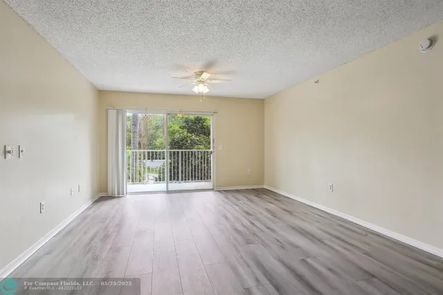 $275,000 | 5051 Wiles Road, Unit 201, Coconut Creek, FL 33073