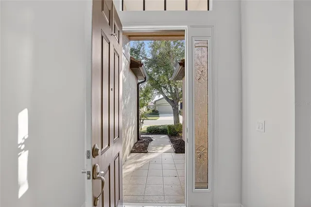 a kitchen with a sink and a refrigerator