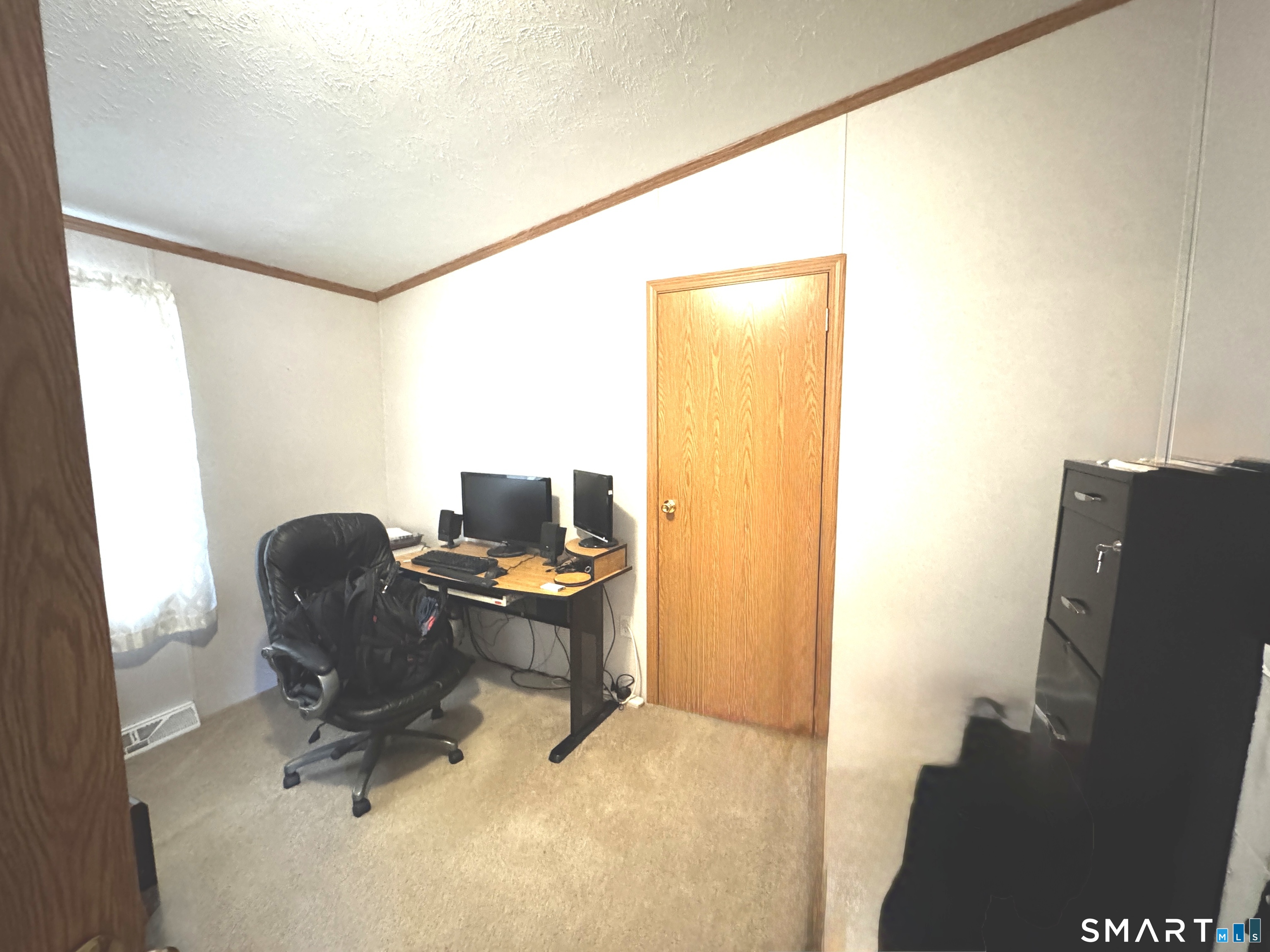 11 Circle Drive Windham, CT 06256 - Photo 14 of 18 a view of workspace with wooden floor windows
