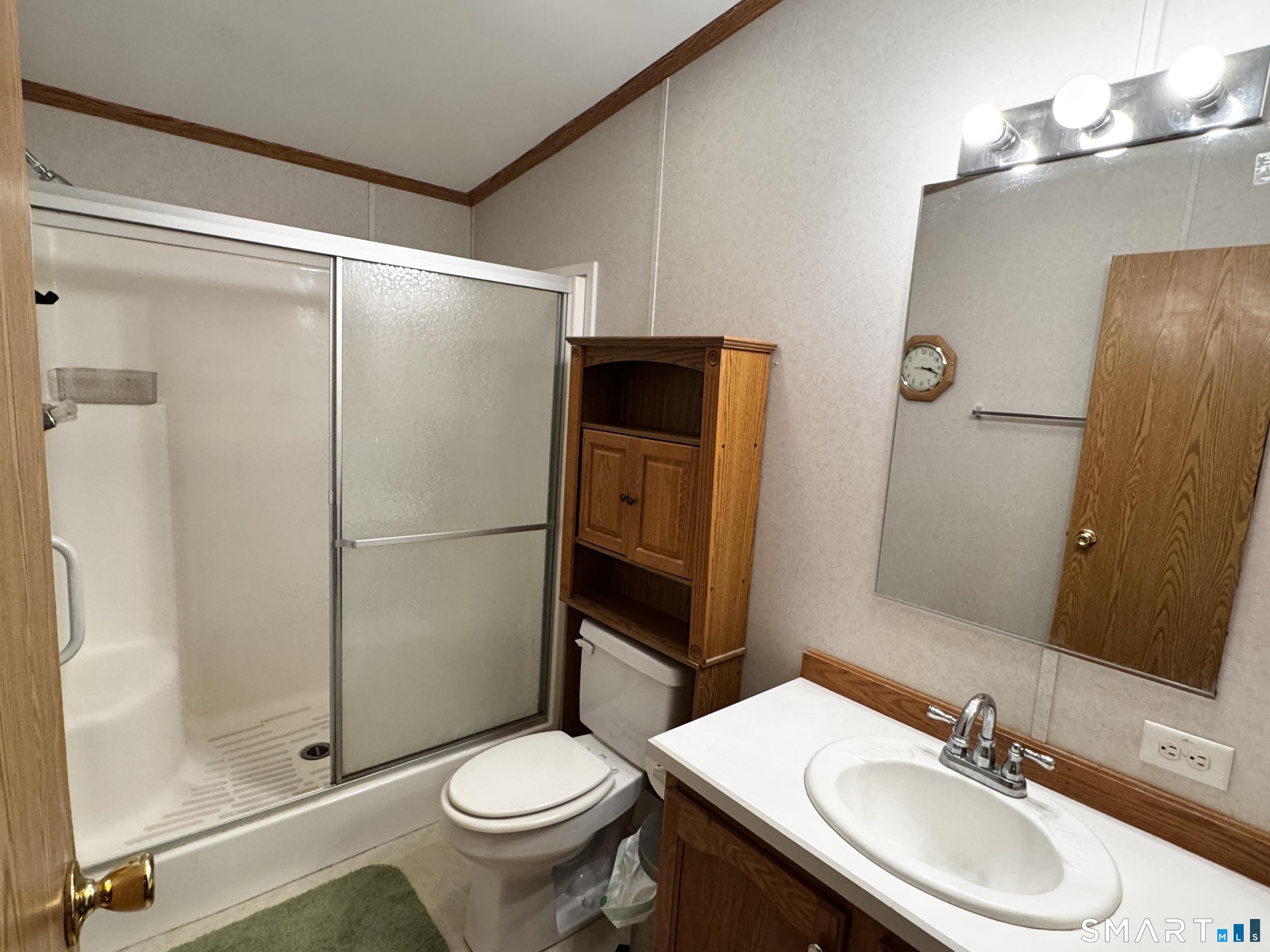 11 Circle Drive Windham, CT 06256 - Photo 15 of 18 a bathroom with a sink toilet and shower