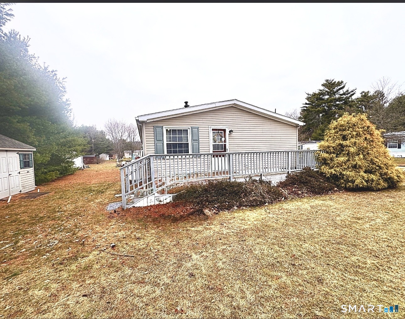 11 Circle Drive Windham, CT 06256 - Photo 16 of 18 a backyard of a house with wooden fence