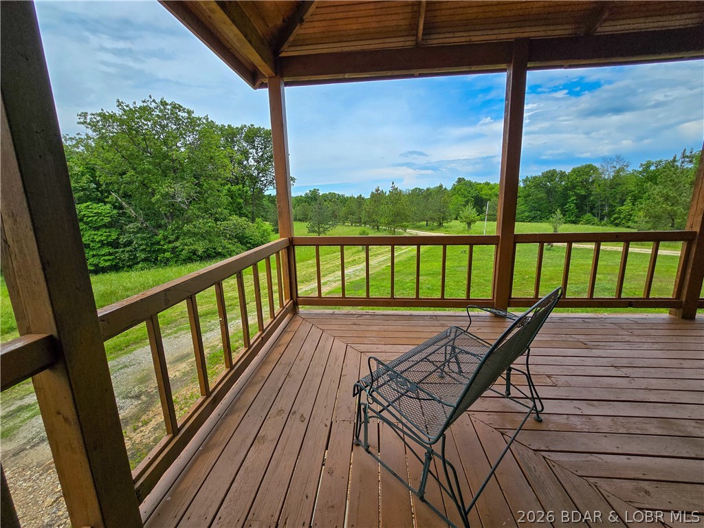 27271 Little Buffalo Road Stover, MO 65078 - Photo 2 of 50 Come sit a while on your own wrap around porch ove