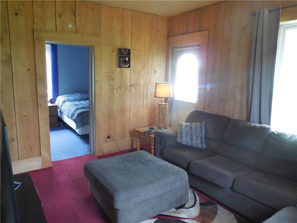 4183 Old Pittsburgh Road Wampum, PA 16157 - Photo 11 of 24 a living room with furniture and a wooden floor