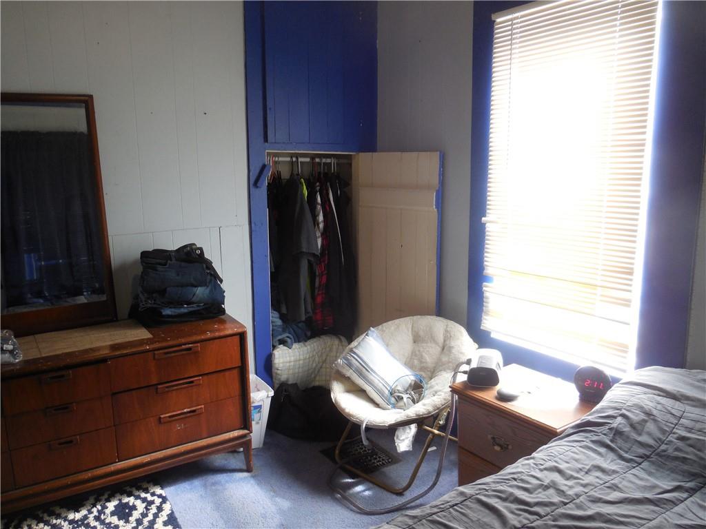 4183 Old Pittsburgh Road Wampum, PA 16157 - Photo 13 of 24 a living room with furniture and a window