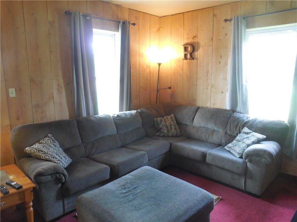 4183 Old Pittsburgh Road Wampum, PA 16157 - Photo 10 of 24 a living room with furniture and a window