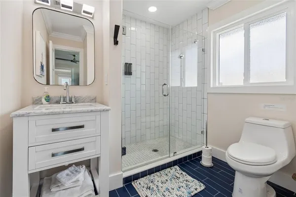 a view of a glass door and a floor to ceiling window