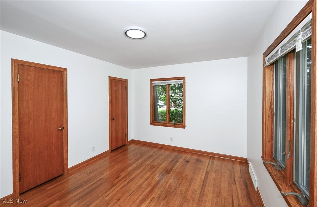 351 North Messner Road Akron, OH 44319 - Photo 31 of 44 *BDRM #3 W/DOUBLE CLOSET ACCESS, 9'7" WIDE CLOSET, FRESH PAINT, LED LIGHTING AND NATURAL HARDWOOD FLOOR ~