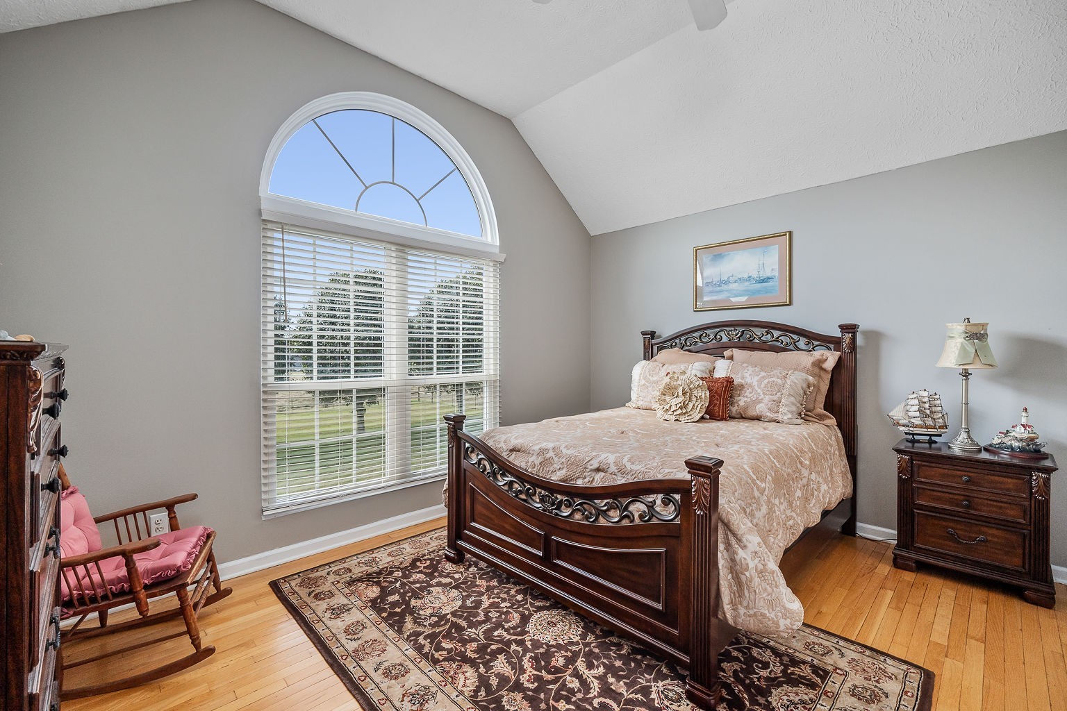 926 Ball Park Road Morrison, TN 37357 - Photo 29 of 69 a bedroom with a bed and wooden floor