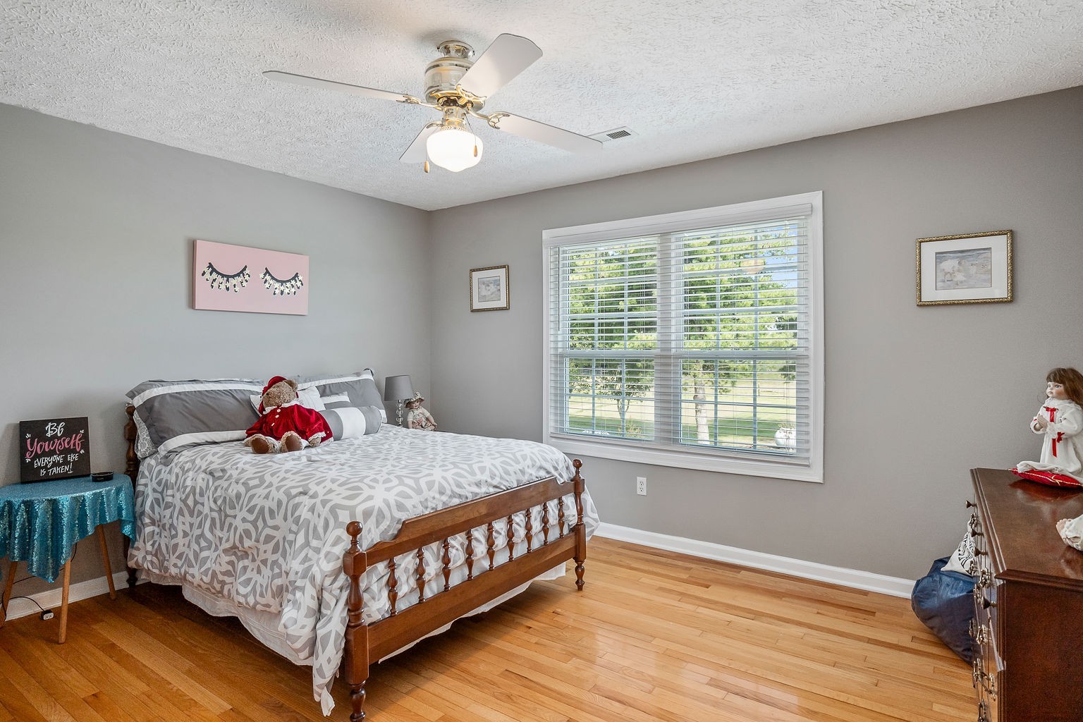 926 Ball Park Road Morrison, TN 37357 - Photo 32 of 69 a bedroom with a bed and wooden floor